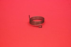 Carburettor throttle return spring