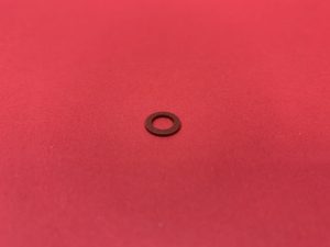 Carburettor pump jet fiber washer