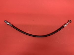 Flexible hose to clutch taker