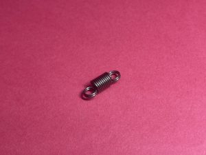 Molla di trazione del meccanismo di blocco della porta