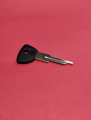 Ignition key blind with black plastic cover
