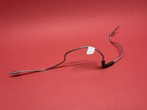 Pipe from steering pinion rear to T-piece on left chassis beam