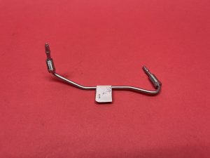 Pipe from front height regulator bottom to T-piece