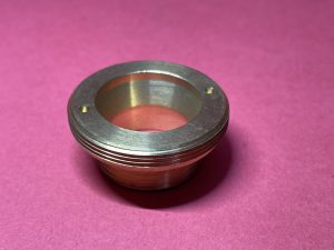 Mirror foot nut in door