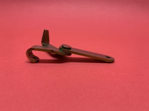 Koplamp besturing mechanisme onder lamp links