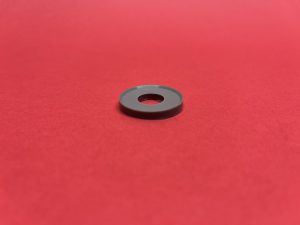 Nylon washer under bolt rear wing