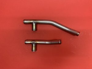 Set of heater conduit pipes, stainless steel with extra outlet for mounting heat exchanger