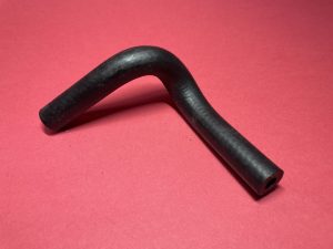 Fuel hose pre-formed to fuel pump