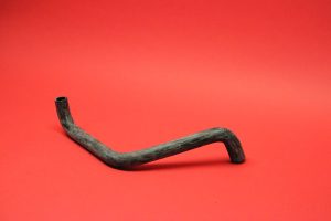 Water hose expansion tank to water pump carb. --> 7/72