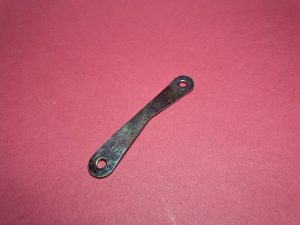 Headlight steering reinforcement bracket on top of control bracket