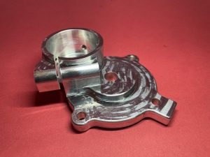 Steering pinion housing clamp