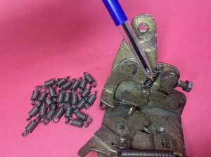 Door lock mechanism spring short