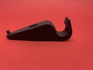 Headlight height adjustment shaft holder